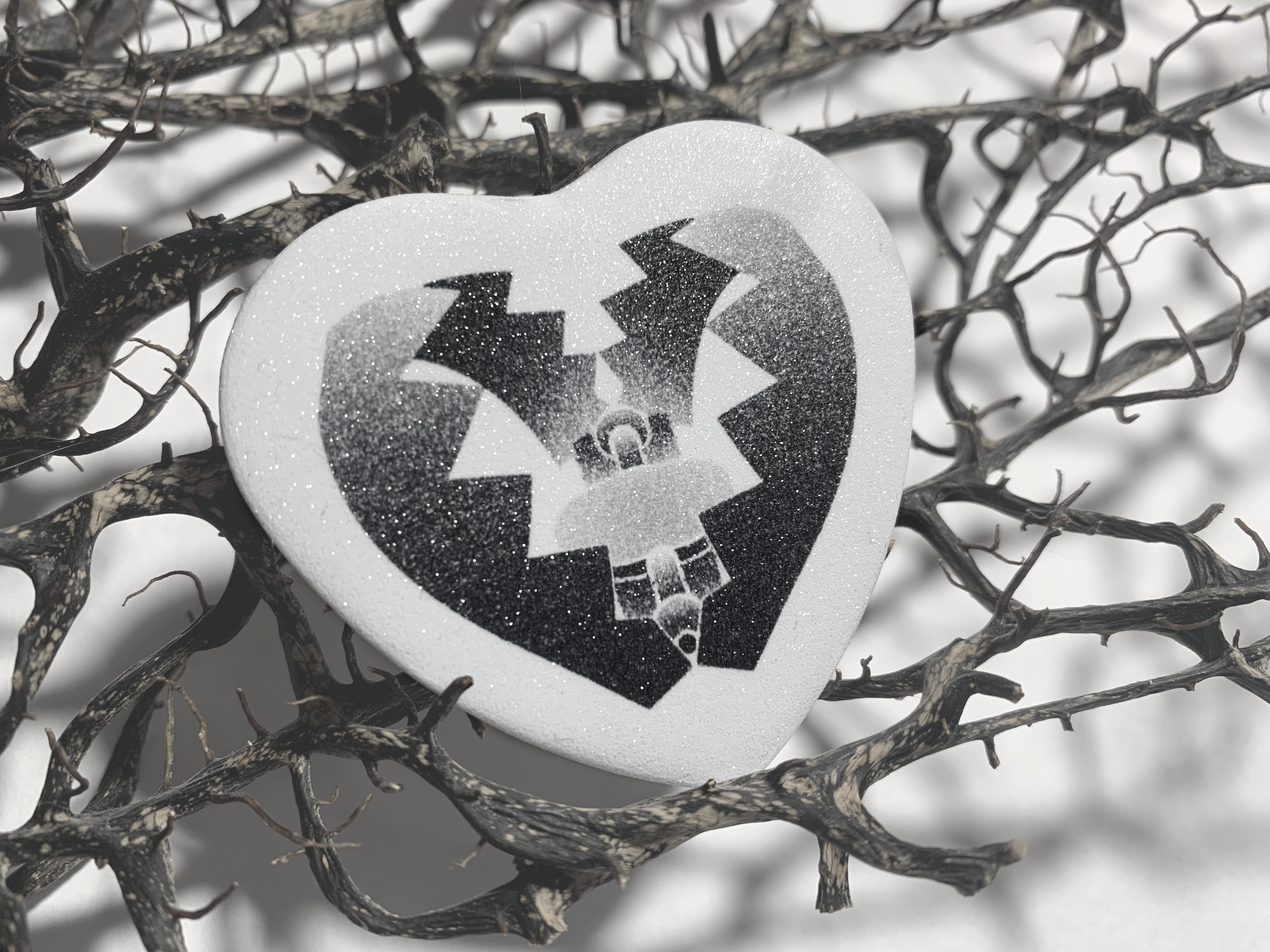 Значок сердце капкан