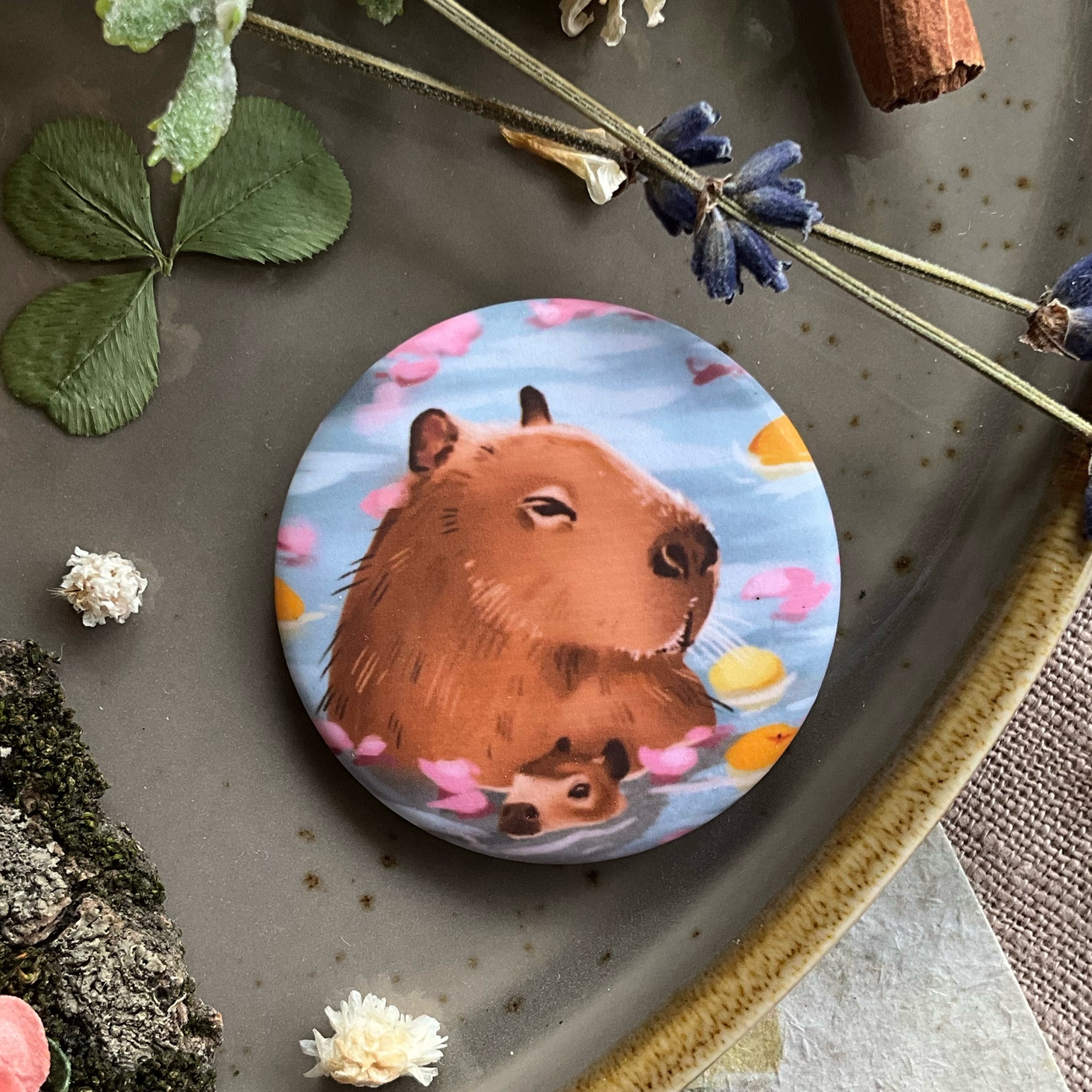 Значок "Капи"