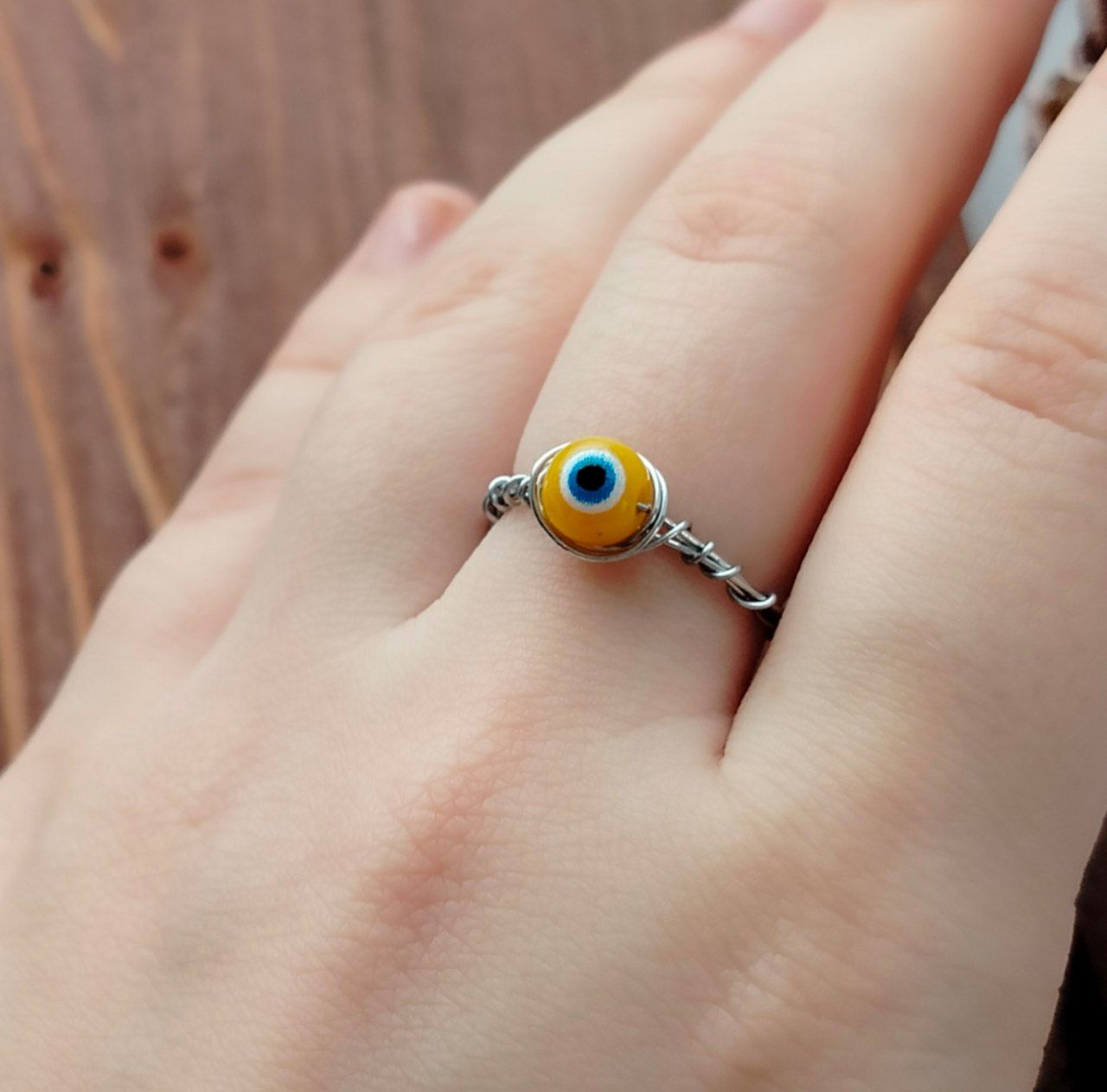 Кольцо 17 с глазом желт.